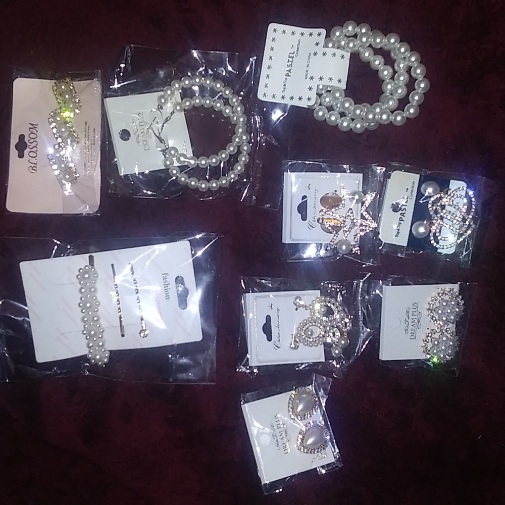 Huge lot of 9. Earrings, barrettes, and bracelets. Faux pearl but very beautiful
